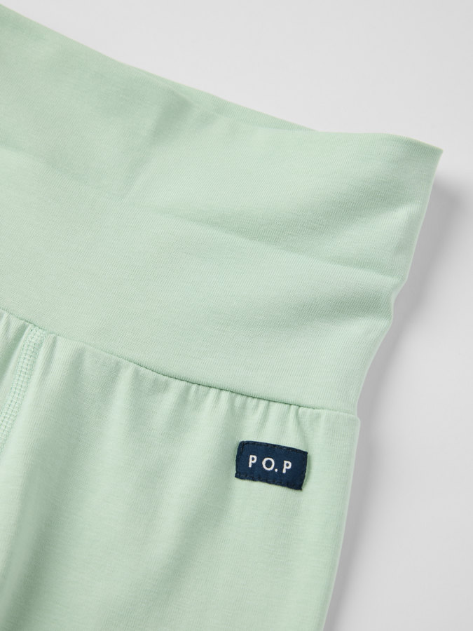 Yksiväriset housut taitettavilla resoreilla Yksiväriset housut taitettavilla resoreilla